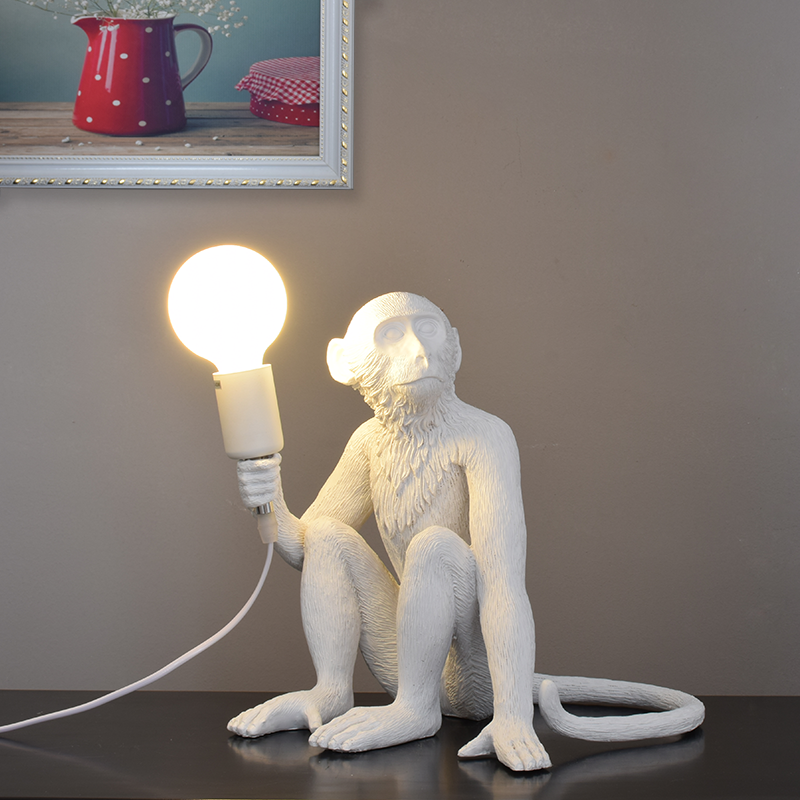 Monkey lamp holding two lights on sale